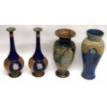 Group of Royal Doulton stoneware vases, one by Florence Roberts, with tube lined floral design,