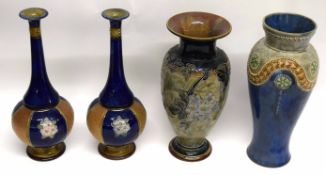 Group of Royal Doulton stoneware vases, one by Florence Roberts, with tube lined floral design,