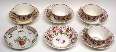 Part English pottery lustre ware tea set with typical floral design comprising 5 cups and 4 saucers,