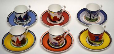 Group of six coffee cans and saucers manufactured by Wedgwood to celebrate the centenary of