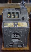 Vintage fruit machine labelled for Mills, 38cm wide