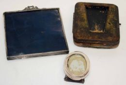 Box of small silver photograph frame, and further hallmarked silver covered clock case and another