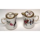 Two Paragon china jugs and covers with a floral design including a bird on branch (2)