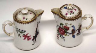 Two Paragon china jugs and covers with a floral design including a bird on branch (2)