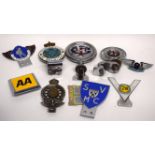 Box of vintage caravans/car badges