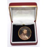 Vintage oval pendant inset with a print depicting a head and shoulders of a gentleman