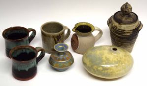 Group of Studio Pottery wares including three mugs, jug, a vase and cover (qty)