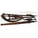 Collection of various tribal and other wares including fighting knives, smoking pipe, horn etc