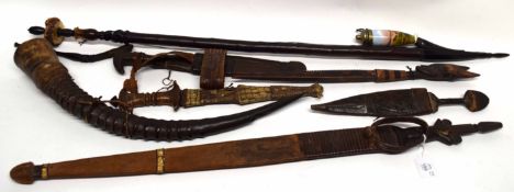 Collection of various tribal and other wares including fighting knives, smoking pipe, horn etc