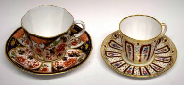 Crown Derby breakfast cup and saucer together with a further Minton cup and saucer, the latter