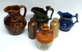 Group of pottery jugs, two by Wood & Sons, a further liqueur whisky flask and cover, and lemonade