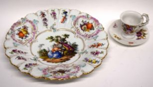 Meissen dish with pastoral scene to centre and fruit decoration to rim, cancelled crossed swords