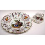 Meissen dish with pastoral scene to centre and fruit decoration to rim, cancelled crossed swords