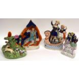 Group of Staffordshire wares including two figures on a boat, one of a hunting scene, (4)