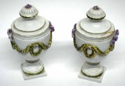 Pair of Italian creamware (Nove di Bassano) urns decorated in neo-classical style, early 19th