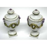 Pair of Italian creamware (Nove di Bassano) urns decorated in neo-classical style, early 19th