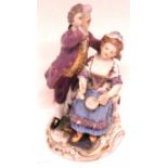 Late 19th/early 20th century Meissen group of two children with pipes, crossed swords mark to