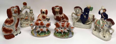 Group of Staffordshire wares including models of two cows and calves on oval bases, three