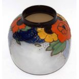 Royal Doulton Art Deco globular vase decorated with tube lined flowers in various colours