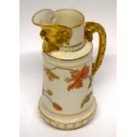 Worcester jug with mask spout and gilt handle, the blush ground body decorated with flowers, factory