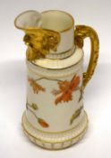 Worcester jug with mask spout and gilt handle, the blush ground body decorated with flowers, factory