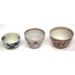 Group of three tea bowls comprising a Worcester bowl with blue and white design, a Chinese