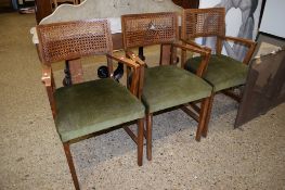 SET OF THREE EARLY 20TH CENTURY CANE BACK GREEN SEATED CARVER CHAIRS