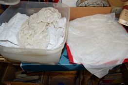 PLASTIC CONTAINER AND TWO BOXES CONTAINING VARIOUS LINEN INCLUDING BABY DRESSES ETC