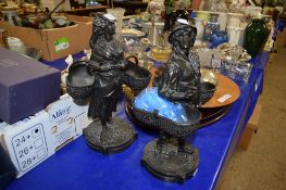 TWO SPELTER EUROPEAN STYLE SWEETMEAT FIGURES ON CIRCULAR BASES