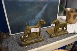 PAIR OF BRASS BOOKENDS MODELLED AS FOX TERRIERS TOGETHER WITH A COLOURED PRINT