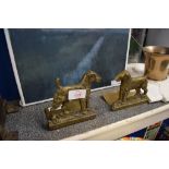 PAIR OF BRASS BOOKENDS MODELLED AS FOX TERRIERS TOGETHER WITH A COLOURED PRINT