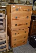 PAIR OF PINE THREE DRAWER BEDSIDE CABINETS WITH MILITARY STYLE HANDLES, 53CM WIDE