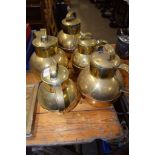 FIVE BRASS JUGS AND COVERS