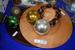 WOODEN SERVING TRAY WITH BRASS HANDLES, ANOTHER WOODEN TRAY AND SOME LARGE GLASS BALLS