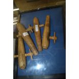 FOUR WOODEN PEGS