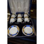 BOXED SET OF SIX COFFEE CANS AND SAUCERS BY GRINDLEY IN THE IVORY PATTERN, TOGETHER WITH A GROUP