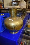 LARGE BRASS GLOBULAR JUG WITH STRAP HANDLE AND COVER