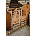 SET OF FOUR PINE SLAT BACK KITCHEN CHAIRS WITH RUSH SEATS
