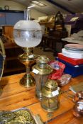 THREE BRASS OIL LAMPS, ONE WITH GLASS SHADE