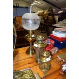 THREE BRASS OIL LAMPS, ONE WITH GLASS SHADE