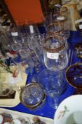 QUANTITY OF GLASS WARES INCLUDING WINE GLASSES AND LIQUEUR GLASSES