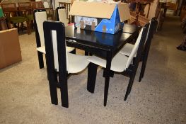 BLACK LACQUERED DINING SUITE OF TABLE AND SIX CHAIRS