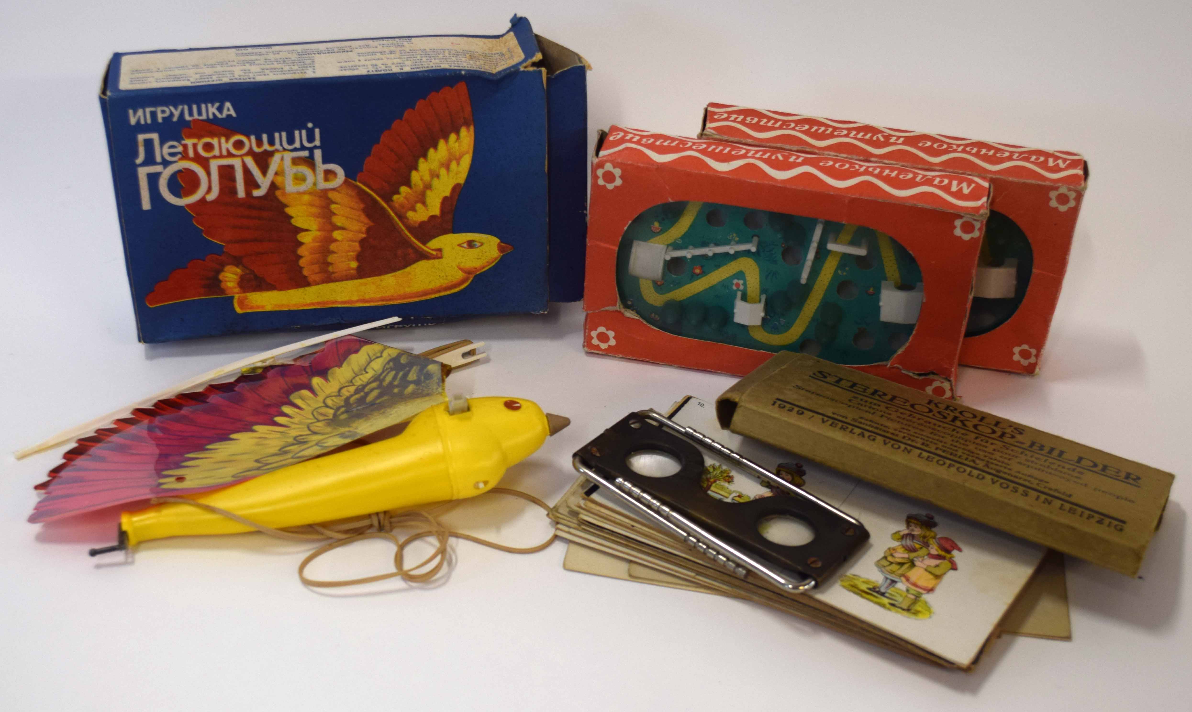 1950s/1960s Russian flying bird toy in original box with instructions, together with two pinball