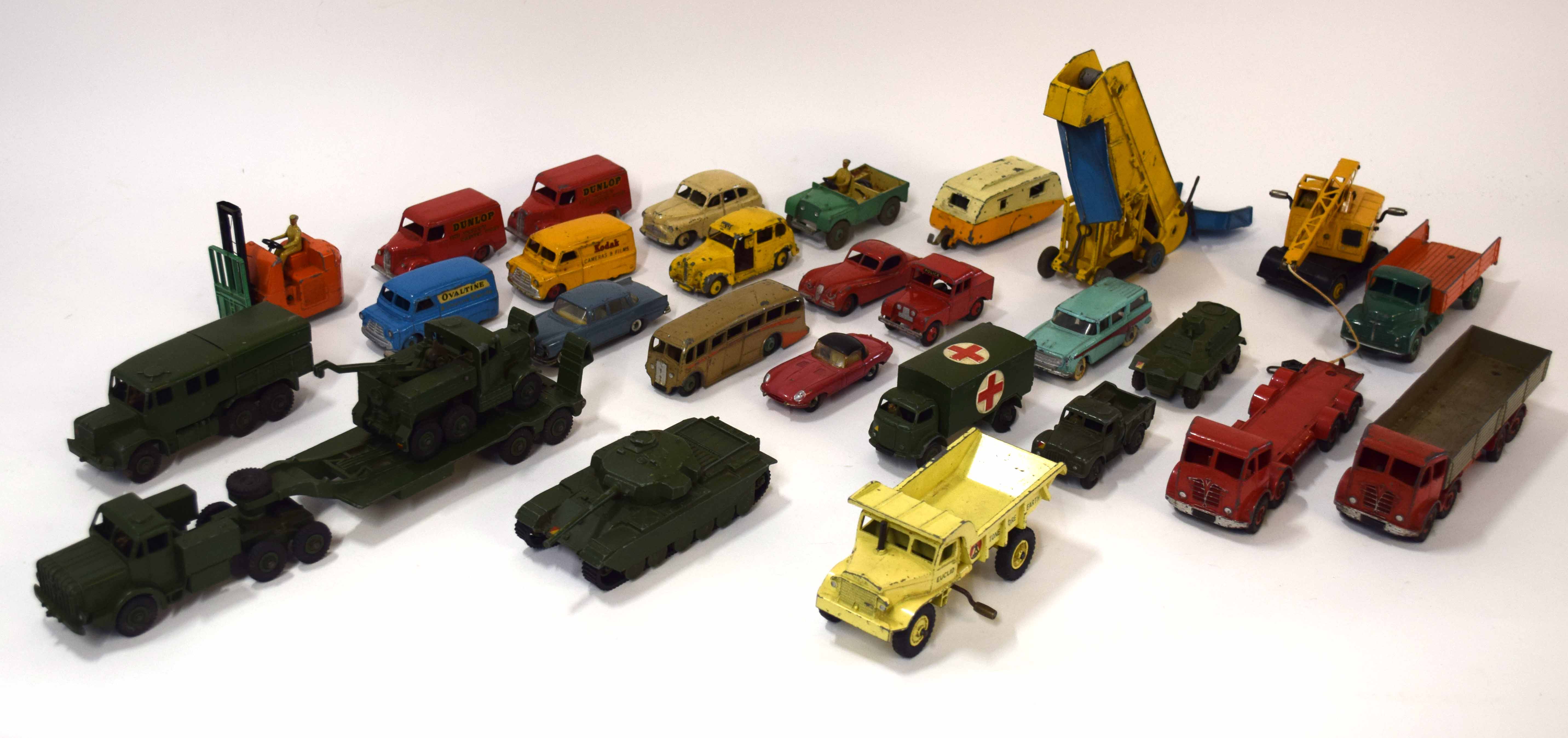 Quantity of 1950s Dinky vehicles to include Dunlop van, Kodak Cameras van, Foden trucks and group of