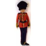 Circa 1930s/40s cloth figure of a guardsman made by J K Farnell Alpha Toys H.M. The King
