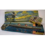 Three boxed vintage model kits to include SS United States by Revel and aircraft carrier Wasp