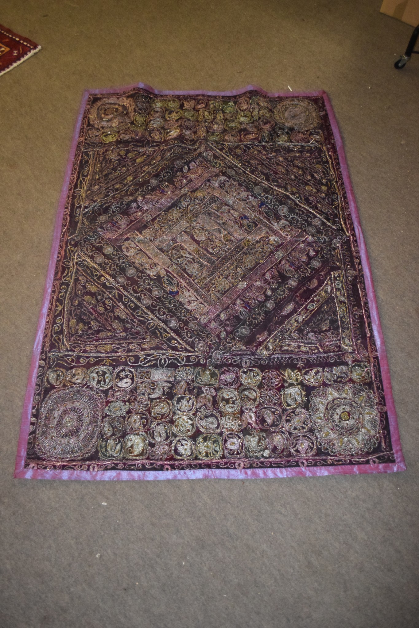 Indian type fabric and wire work wall hanging, 96cm wide