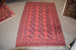 Modern Shiraz type carpet, central panel of lozenges within a multi-gull border, mainly red field,