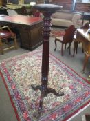 Mahogany torchere stand with tripod base, 131cm high