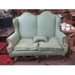 Early 20th century double arch back green upholstered two-seater sofa, 149cm wide